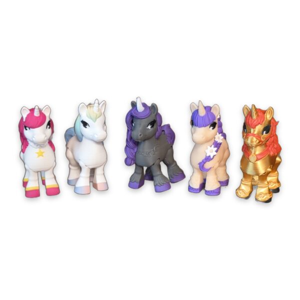 articulating-unicorn-figurine-2-inch-1 Five small unicorn figurines in different colors lined up side by side, each with articulating legs.