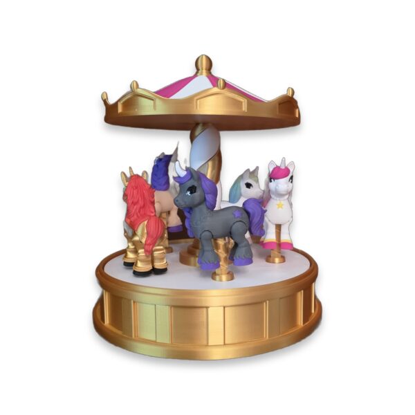 carousel-toy-spinning-figurine-posts-pink-gold-2 The same carousel toy with unicorn figurines placed on each of the five posts around the base.