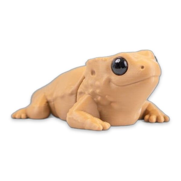 Close-up of the bearded dragon figure's face and front legs, showing texture detail.
