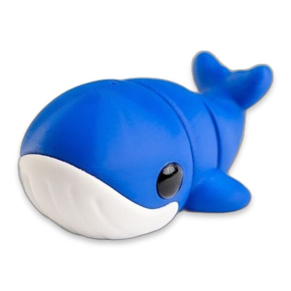 Blue whale figurine with white belly and curved tail fin, viewed from the back showing its raised tail.