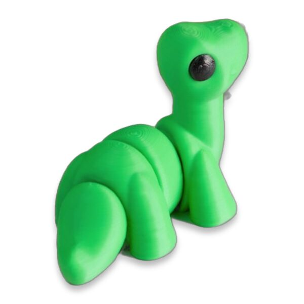 articulated-baby-brontosaurus-fidget-toy-2 Side view of the green articulated baby brontosaurus figure showing its segmented neck and back, next to leaves.
