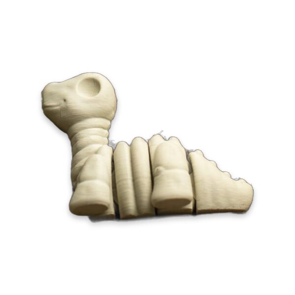 articulated-baby-brontosaurus-skeleton-fidget-toy-2 The brontosaurus figure shown small in scale next to two sprigs of greenery.