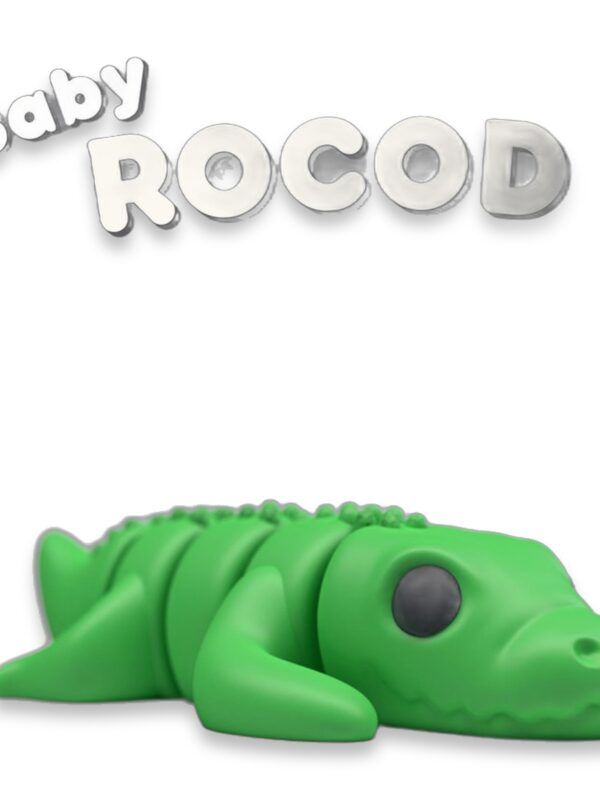 articulated-baby-crocodile-fidget-toy-1 A green articulated baby crocodile figure lying on a gray background with text reading Baby Crocodile.