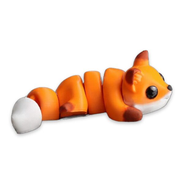An orange and white articulated fox figure resting its head on a textured wooden log, labeled Baby Fox.