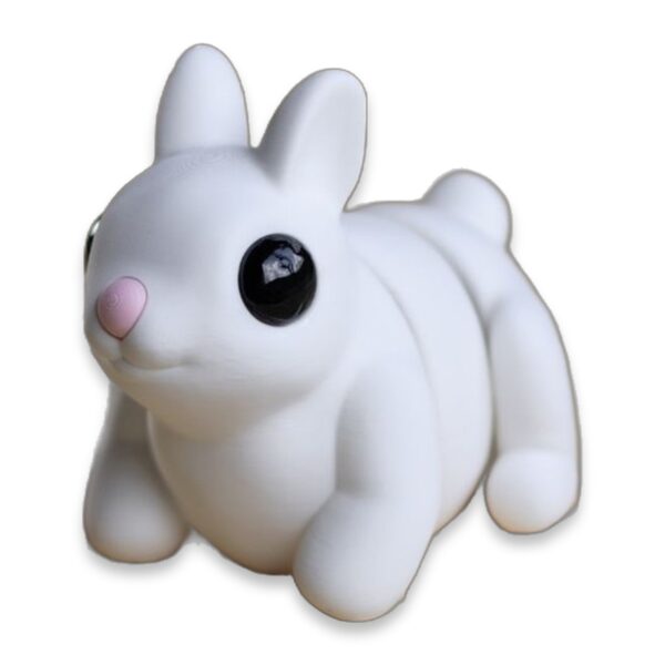 White articulated bunny figure sitting with ears up and head turned, showing its segmented poseable body.