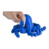 articulated-octopus-fidget-toy-poseable-desk-buddy-1 A hand holds up one curled tentacle of a blue articulated octopus toy.