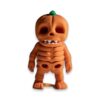 articulated-pumpkin-skeleton-fidget-toy-poseable-desk-buddy-2 Side-angle view of the pumpkin skeleton figure showing its jointed body and jack-o'-lantern face.