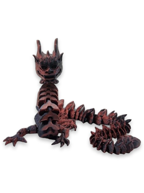 flexi-imperial-dragon-poseable-print-in-place-1 Copper and black articulated dragon figure posed with its head raised and tail curled.
