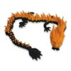 Black and orange articulated dragon curled into a loop showing its flame-like spikes.