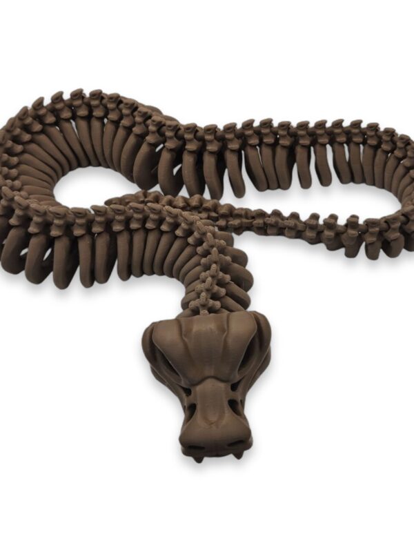 Five 3D printed skeleton snakes coiled together in gray, teal, tan, and brown colors showing fanged skull detail.